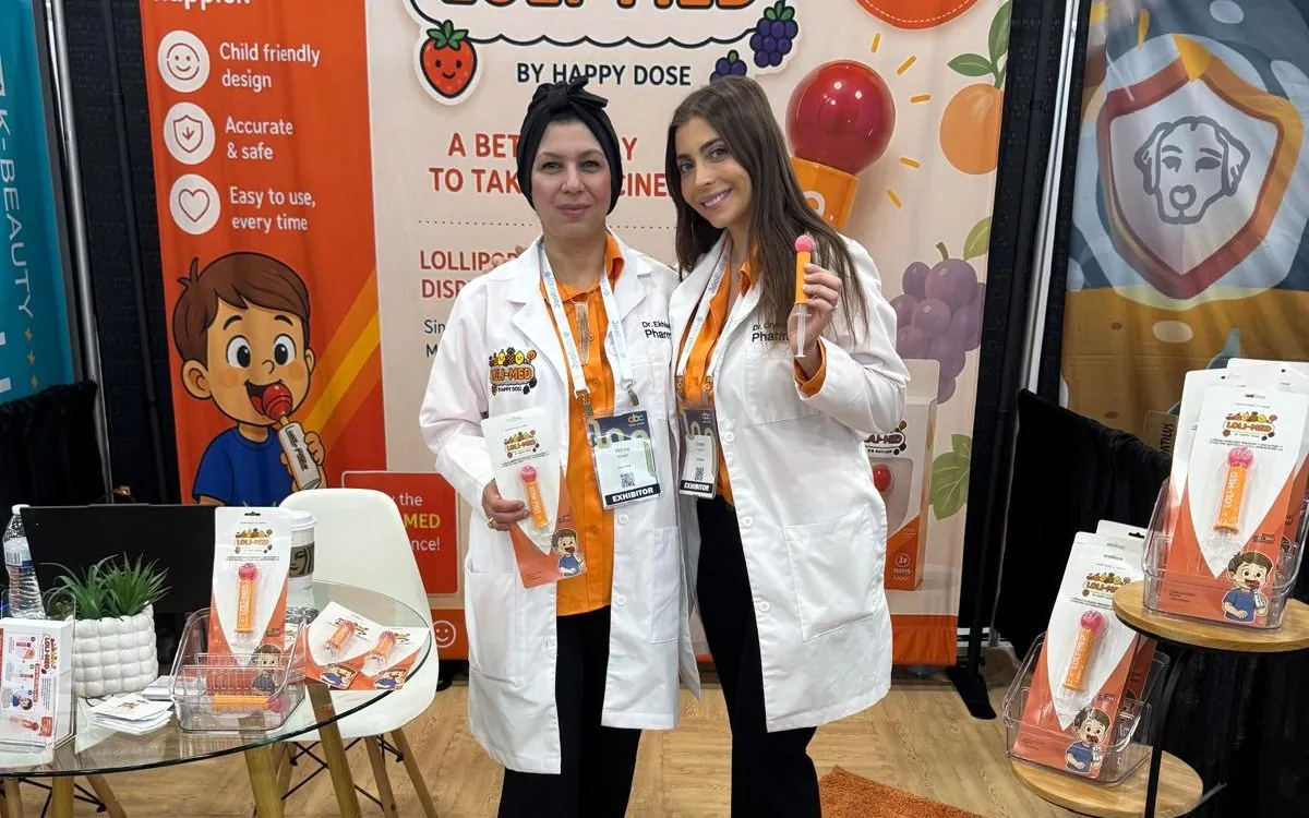 Loli-Med founders at the ABC Kids Expo booth